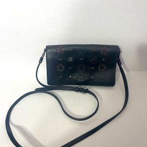 Fold over crossbody clutch